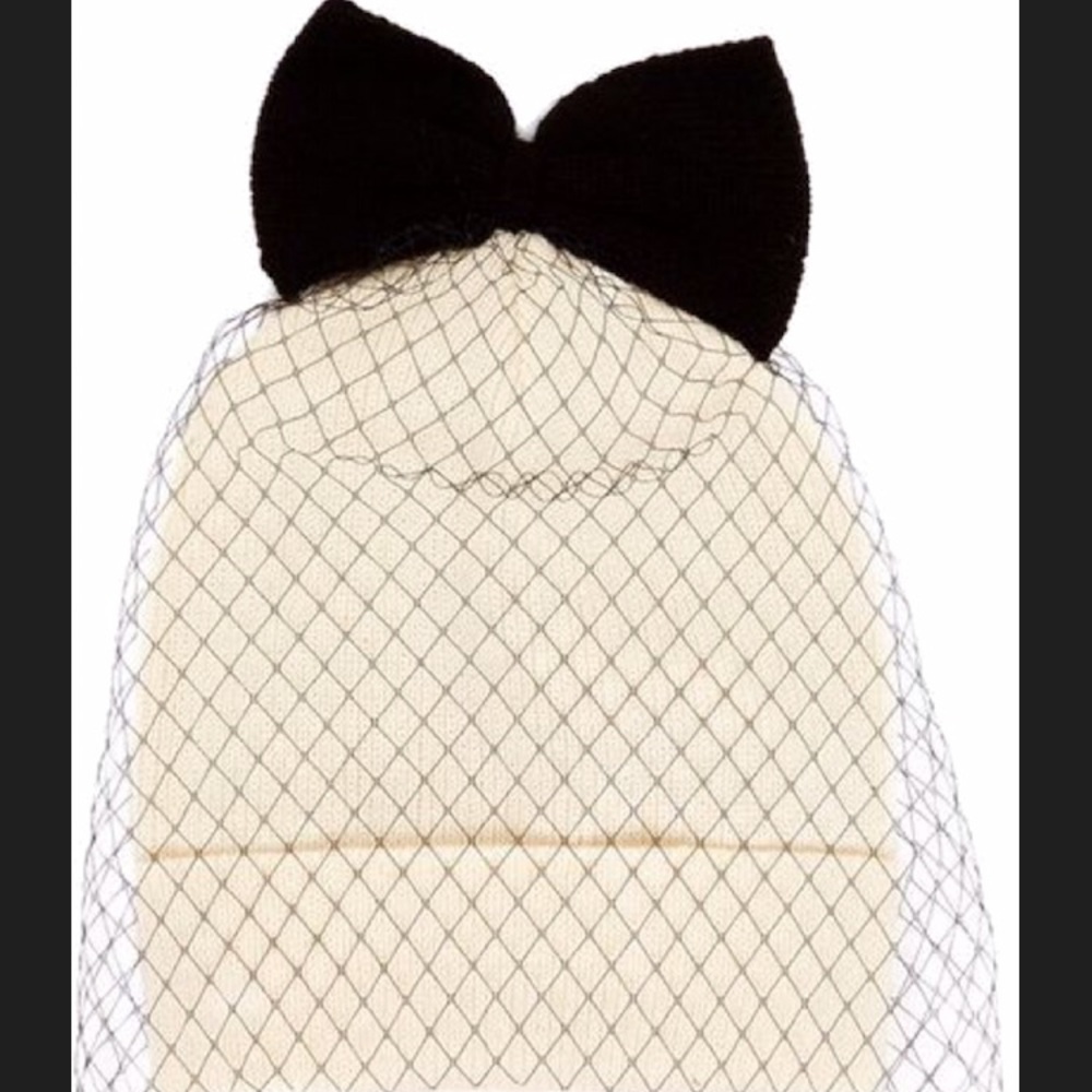 Betsy Johnson cream winter hat with black bow